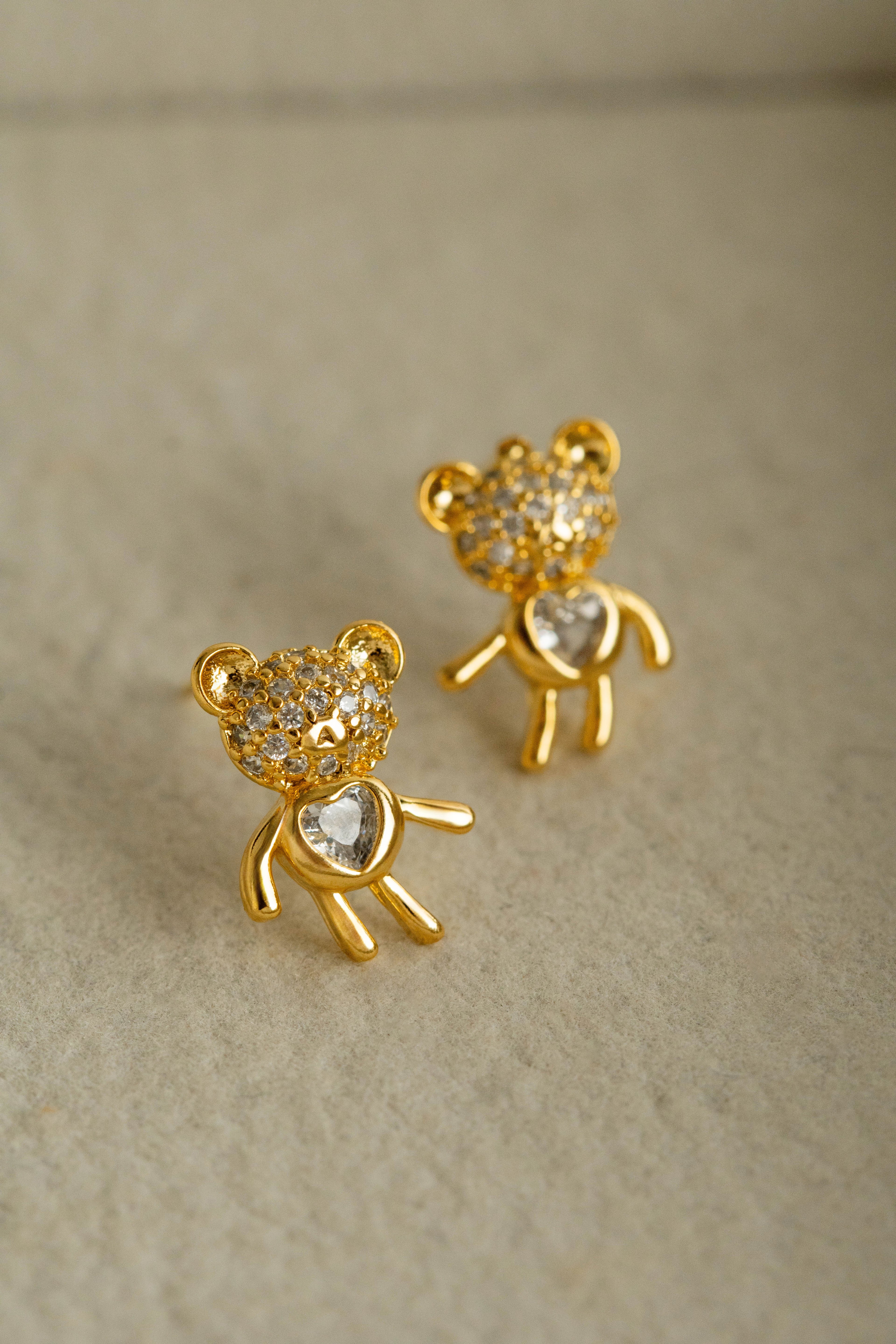 BRINCO URSINHO DE ZIRCONIA BANHADO A OURO.